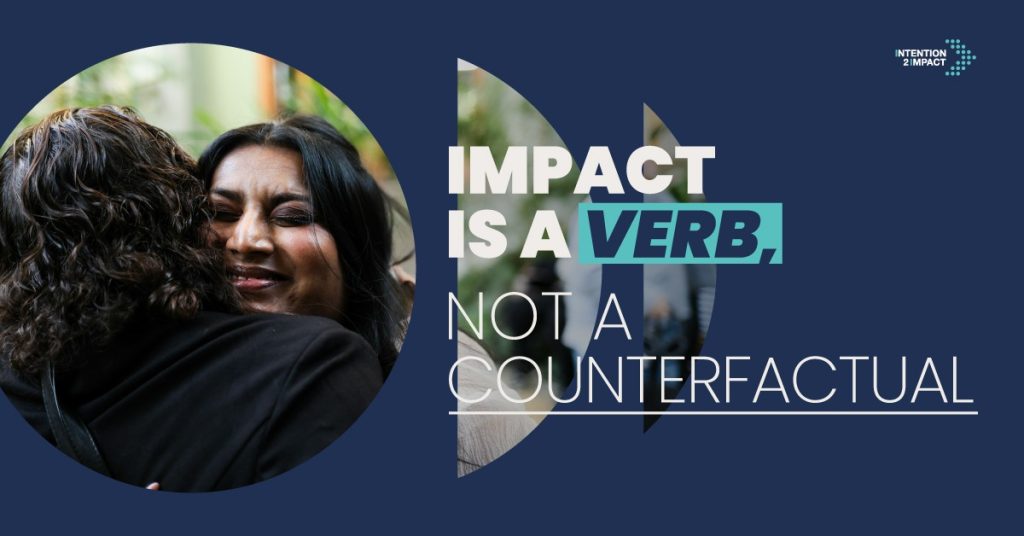 "Impact is a Verb, Not a Counterfactual" campaign graphic featuring two women embracing in a warm hug, with the Intention 2 Impact logo.